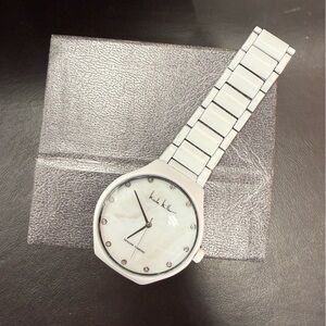 Nicole Miller Elegant White Watch with Crystal Accents